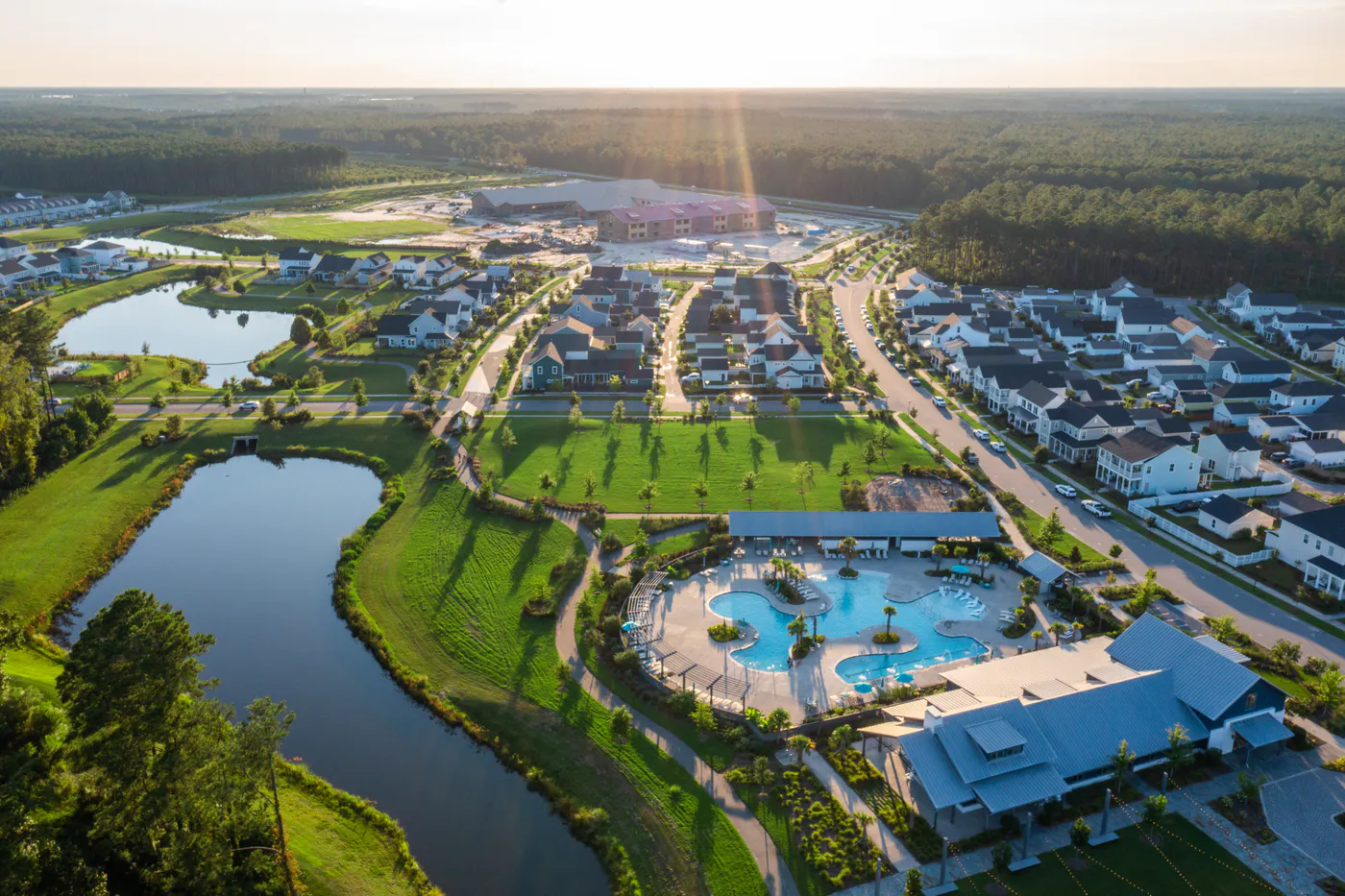 Aerial view of Midtown Nexton homes, ponds, green space and a pool